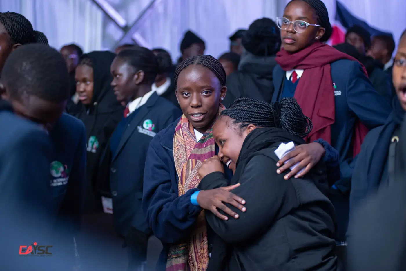 Students embracing at the East Africa Youth Student Convention