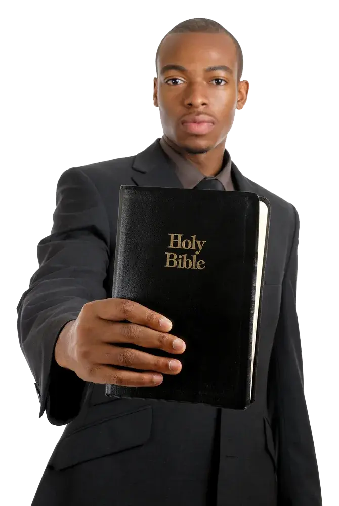 A man holding a Holy Bible