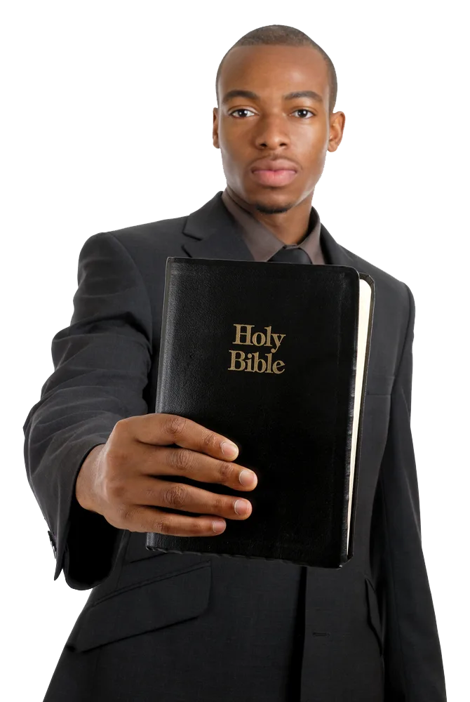 A man holding a Holy Bible